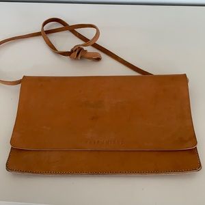 Gently used handmade clutch by Half United